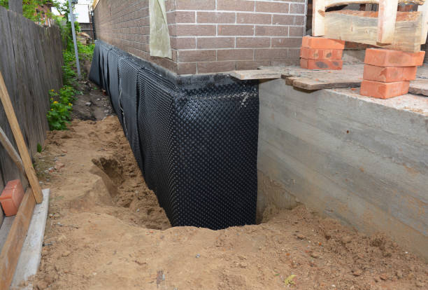 Happy homeowners after waterproofing job in Junction City